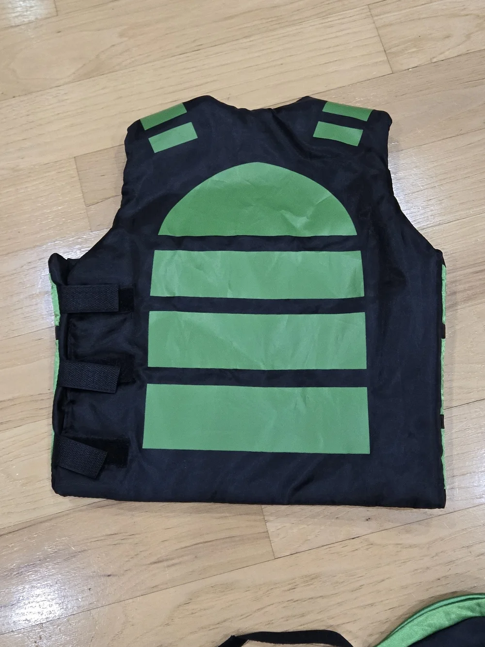Kids Black Vest with Neon Green Paw Design